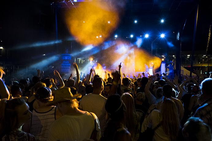 Guests Dance during the 80/35 music festival in Des Moines on Saturday July 8, 2017. This years 80/35 is the tenth anniversary of the downtown Des Moines festival. (Nick Rohlman/The Daily Iowan)