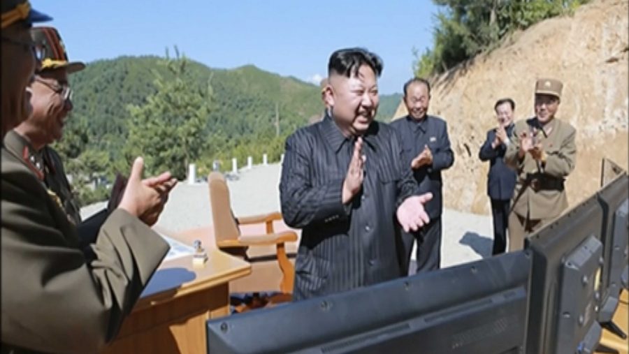 This image made from video of a news bulletin aired by North Koreas KRT on Tuesday, July 4, 2017, shows what was said to be North Korea leader Kim Jung Un, center, applauding after the launch of a Hwasong-14 intercontinental ballistic missile, ICBM, in North Koreas northwest. Independent journalists were not given access to cover the event depicted in this photo. Keeping North Korea from having a nuclear-armed intercontinental ballistic missile has long been considered a key U.S. red line; and one Pyongyang has thumbed its nose at for years. Its Fourth of July ICBM launch is just the latest step in its long march toward, and maybe over, that line. (KRT via AP Video)