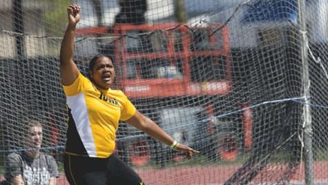 Iowas Laulauga Tausaga watches her throw during the 18th annual Musco Twilight at Francis X. Cretzmeyer Track on Saturday, April 22, 2017. Iowas men and womens track and field finished first overall in the Musco Twilight with a 237.5 and 203 respectively. (The Daily Iowan/Joseph Cress)