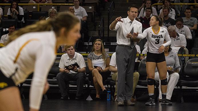 FILE - In this file photo, Iowa head coach Bond Shymansky talks to Iowas no. 3 Alexa Ito before she is substituted back into the match during a volleyball match at the Carver Hawkeye Arena in Iowa City on Saturday, Oct 8, 2016. (Ting Xuan Tan/The Daily Iowan, file)
