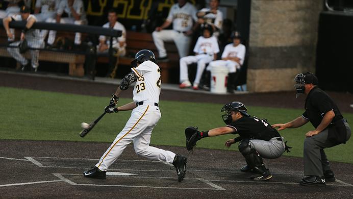 Iowa infielder Kyle Crowl makes contact with the pitch during the game between Omaha-Iowa at Duane Banks Field on Tuesday, May 16, 2017. The Hawkeyes pull off another comeback win with three runs in the 8th inning and two runs in the 9th inning for the 9-8 victory. (The Daily Iowan/ Alex Kroeze)