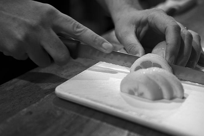 Bartender Ben Mummey slices lemons to prepare for the day at the Deadwood Tavern in Iowa City on Thursday June 29, 2017. On July 1,  Ben Mummey bought the Deadwood from longtime owner Jim Bell. (Nick Rohlman/The Daily Iowan)