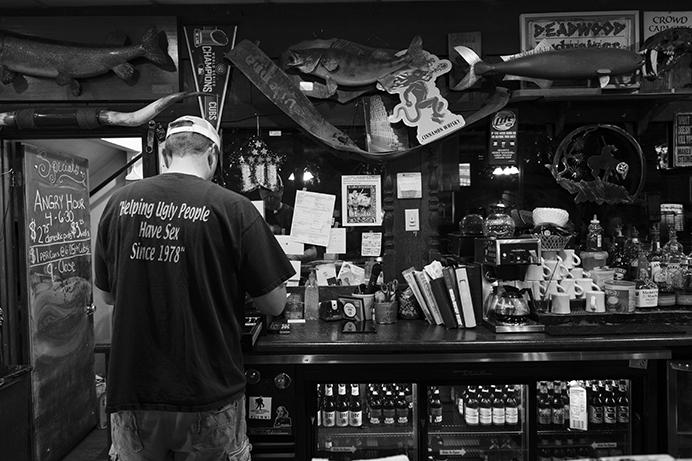 Bartender Ben Mummey prepares for the day at the Deadwood Tavern in Iowa City on Thursday June 29, 2017. On July 1,  Ben Mummey bought the Deadwood from longtime owner Jim Bell. (Nick Rohlman/The Daily Iowan)