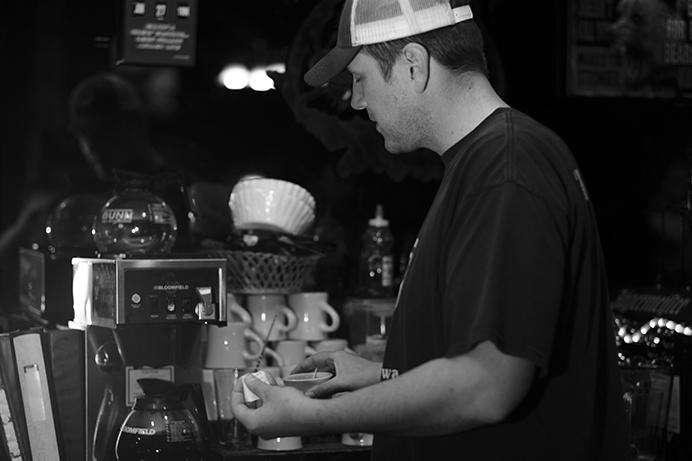 Bartender Ben Mummey prepares for the day at the Deadwood Tavern in Iowa City on Thursday June 29, 2017. On July 1,  Ben Mummey bought the Deadwood from longtime owner Jim Bell. (Nick Rohlman/The Daily Iowan)