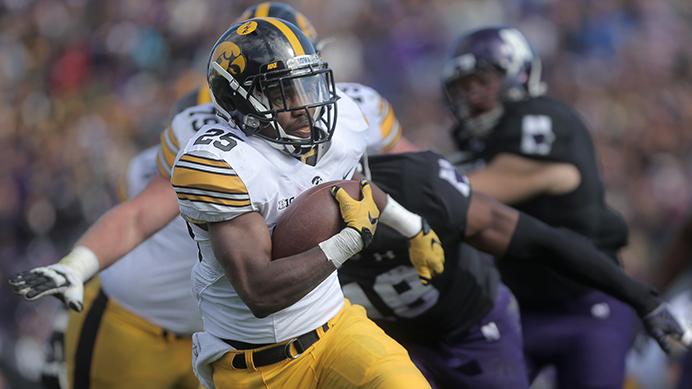 FILE+-+In+this+file+photo%2C+Iowa+running+back+Akrum+Wadley+runs+the+ball+down+the+field+during+the+Iowa-Northwestern+game+on+Saturday%2C+Oct.+17%2C+2015.+Wadley+rushed+for+204-yards+during+the+game.+The+Hawkeyes+beat+the+Wildcats%2C+40-10.+%28The+Daily+Iowan%2FValerie+Burke%29
