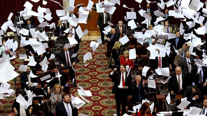 Missouri legislators do the traditional paper toss to end the last day of the legislative session on Friday, May 12, 2017, in Jefferson City, Missouri. (Christian Gooden/cgooden@post-dispatch.com)