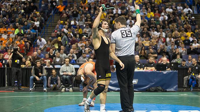 Iowa’s Thomas Gilman celebrates a third place victory during the 2017 NCAA Division I Wrestling Championships in the Scottrade Center in St. Louis, Missouri on Saturday, March 18, 2017. Day 3 brought about many surprises and a great wave of new champions. Iowa came in fourth overall with a team score of 97. (The Daily Iowan/Anthony Vazquez)