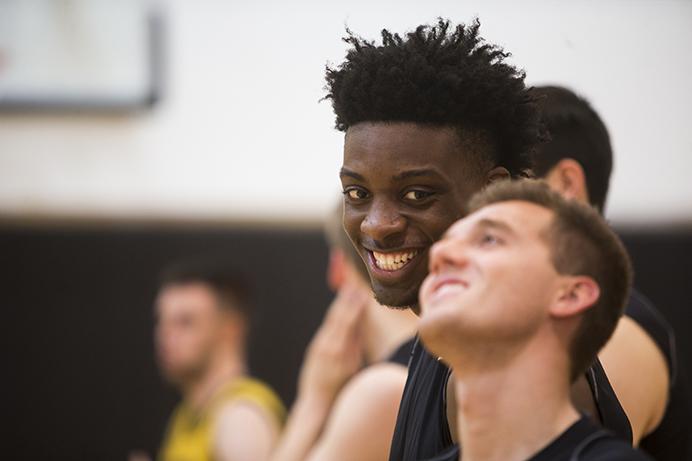 Iowas Tyler Cook jokes with teammate Jordan Bohannon during a mens basketball practice in Carver-Hawkeye Arena on Wednesday, Aug. 2, 2017.  The Hawkeyes will travel to Europe on August 6 for 12 days. (Joseph Cress/The Daily Iowan)