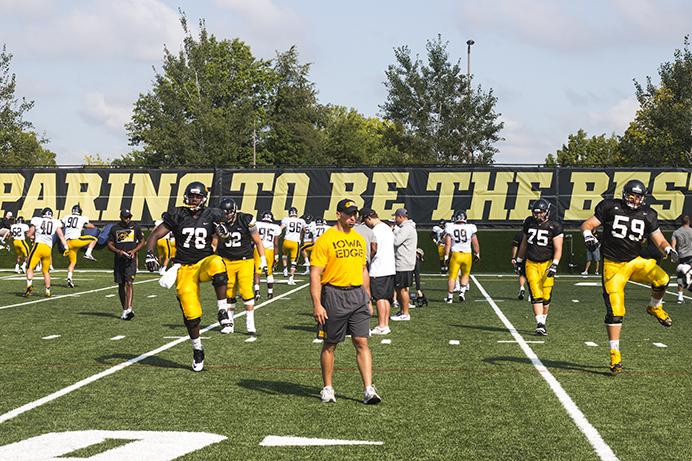 Iowa+offensive+linemen+James+Daniels+%2878%29+and+Ross+Reynolds+%2859%29+warm+up+during+a+summer+camp+practice+at+the+outdoor+practice+facility+on+Monday%2C+Aug.+7%2C+2017.+The+Hawkeyes+will+host+their+annual+kids+day+event+on+Saturday%2C+Aug.+12%2C+at+Kinnick+Stadium.+%28Joseph+Cress%2FThe+Daily+Iowan%29