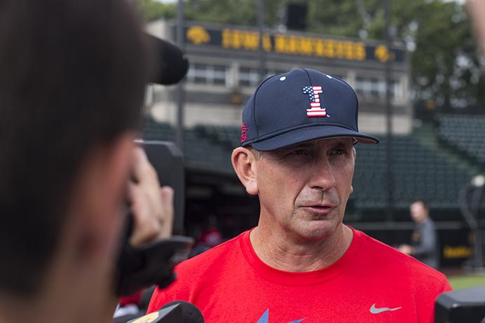 Iowa head coach Rick Heller speaks with members of the media before a baseball practice at Duane Banks field on Tuesday, Aug. 15, 2017.  USA claimed its first medal in the World University Games on Tuesday after losing to Japan, 10-0, in the gold-medal game. (Joseph Cress/The Daily Iowan)