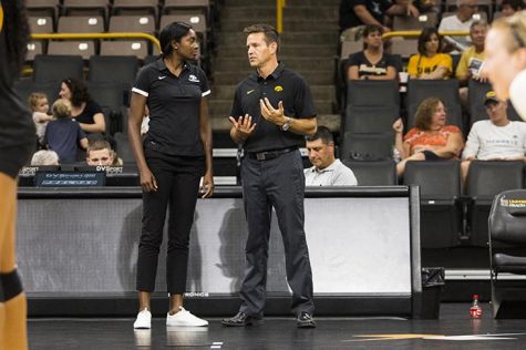 Iowa head coach Bond Shymansky (right) talks with first year associate head coach Vicki Brown during the volleyball Black & Gold scrimmage in Carver-Hawkeye Arena on Saturday, Aug. 19, 2017. The Hawkeyes will host their first home game against Nebraska-Omaha at noon on September 1 to kick off the four game Hawkeye Classic. 