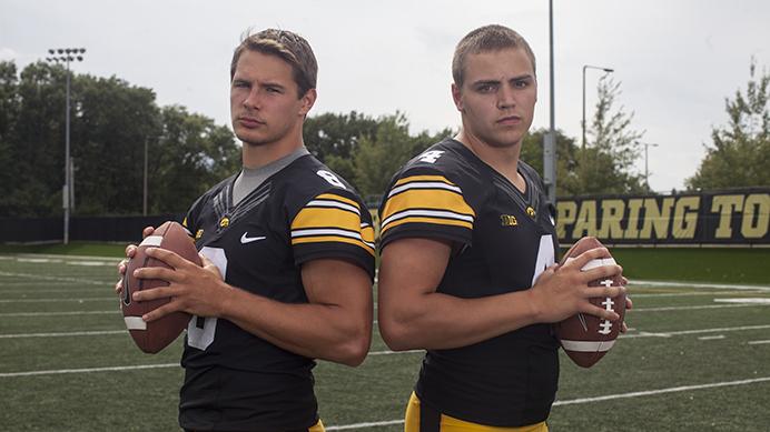 Iowa quarterbacks Tyler Wiegers and Nathan Stanley Quarterbacks Wiegers and Stanley pose for a photo during Iowa Football Media Day on Saturday, Aug. 5, 2017. The Hawkeyes will open the 2017 season at home against Wyoming on September 3. (Nick Rohlman/The Daily Iowan)