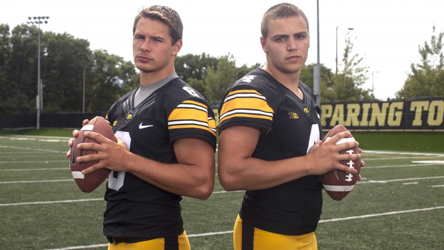Iowa quarterbacks Tyler Wiegers and Nathan Stanley pose for a photo during Iowa football media day on Saturday, Aug. 5, 2017. The Hawkeyes will open the 2017 season at home against Wyoming on September 3. (Nick Rohlman/The Daily Iowan)