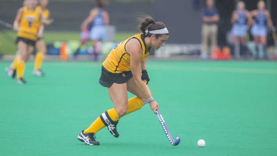 Iowas Mallory Lefkowitz hit the ball during a field hockey game during the Big Ten/ACC Challenge at Grant Field in Iowa City on Sunday, Aug. 27, 2017. The Hawkeyes fell to the Tarheels, 3-0. (Lily Smith/The Daily Iowan)