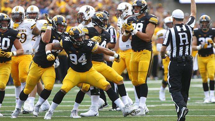 Iowa defensive end A.J. Epenesa celebrates after making a play during an NCAA football game between Iowa and Wyoming in Kinnick Stadium on Saturday, Sept. 2, 2017. (Joseph Cress/The Daily Iowan)