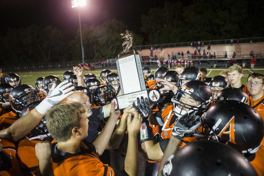 Ames High players celebrate during a 4A football game between City High and Ames for the Little Cy-Hawk trophy at Ames High in Ames on Friday, Sept. 8, 2017. The Little Cyclones defeated the Little Hawks for the second year in a row, 56-33. The Little Cyclones now lead the series 3-1.