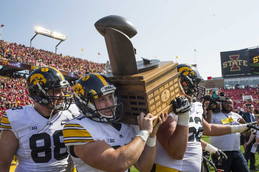 Iowa+players+celebrate+with+the+Cy-Hawk+trophy+during+the+Iowa%2FIowa+State+game+for+the+Cy-Hawk+trophy+in+Jack+Trice+Stadium+on+Saturday%2C+Sept.+9.+The+Hawkeyes+defeated+the+Cyclones%2C+44-41%2C+in+overtime.+%28Joseph+Cress%2FThe+Daily+Iowan%29