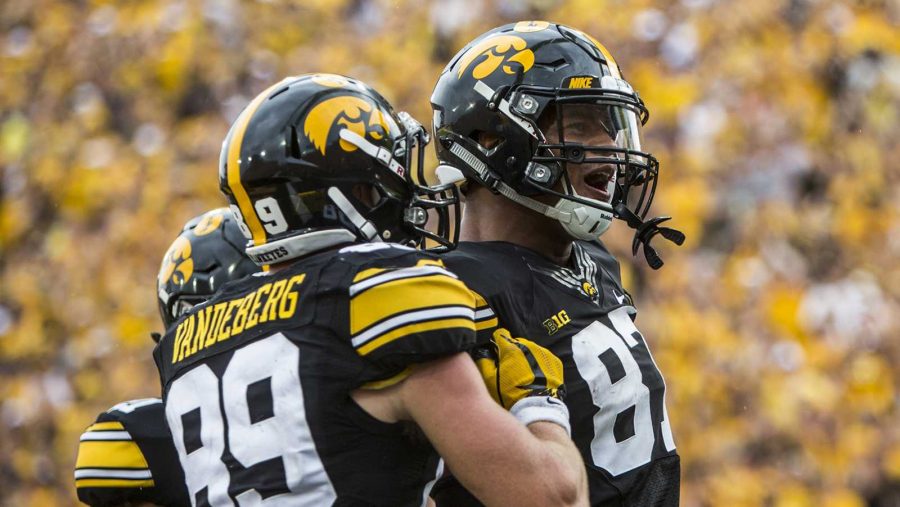 Iowas+Matt+VandeBerg+and+Noah+Fant+celebrate+a+touchdown+during+the+game+between+Iowa+and+North+Texas+at+Kinnick+Stadium+on+Saturday%2C+Sept.+16%2C+2017.+The+Hawkeyes+went+on+to+defeat+the+Mean+Green+31-14.+%28Ben+Smith%2FThe+Daily+Iowan%29