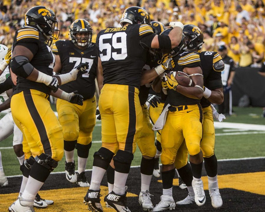 Iowa+offensive+players+celebrate+a+touchdown+run+by+running+back+Ivory+Kelly-Martin+%2821%29+during+the+game+between+Iowa+and+North+Texas+at+Kinnick+Stadium+on+Saturday%2C+Sept.+16%2C+2017.+The+Hawkeyes+went+on+to+defeat+the+Mean+Green+31-14.+%28Ben+Smith%2FThe+Daily+Iowan%29