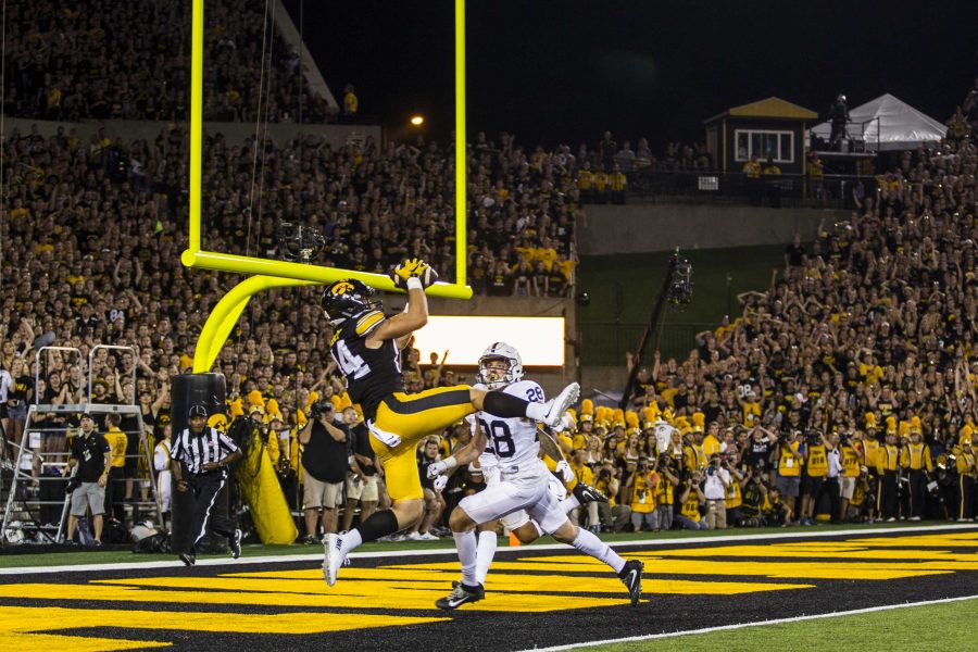 Iowa wide receiver Nick Easly (84) makes a leaping catch for a touchdown during the game between Iowa and Penn State at Kinnick Stadium on Saturday Sept. 23, 2017. (Nick Rohlman/The Daily Iowan)