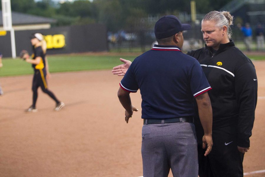 Iowa head coach Marla Looper talks with an official during a NCAA softball Big Four Classic tournament game at Pearl Field in Coralville on Friday, Sept. 29, 2017. The Panthers defeated the Hawkeyes, 3-0. (Joseph Cress/The Daily Iowan)