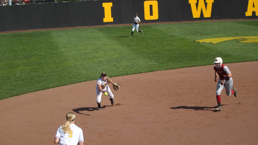 Daniella Ibarra flips the ball to Sarah Kurtz for an out against Iowa State Saturday, Sep. 30, 2017. The Hawkeyes tied the Cyclones 3-3. (Paxton Corey/The Daily Iowan)