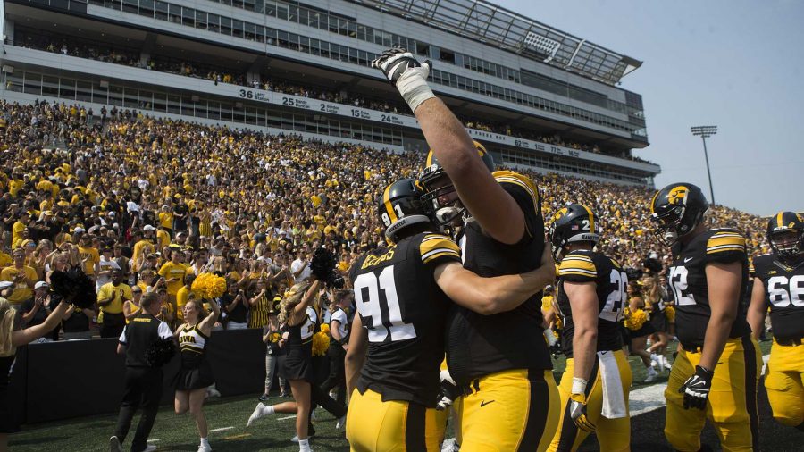 Iowa players celebrate after winning an NCAA football game between Iowa and Wyoming in Kinnick Stadium on Saturday, Sept. 2, 2017. The Hawkeyes defeated Wyoming, 24-3. (Joseph Cress/The Daily Iowan)