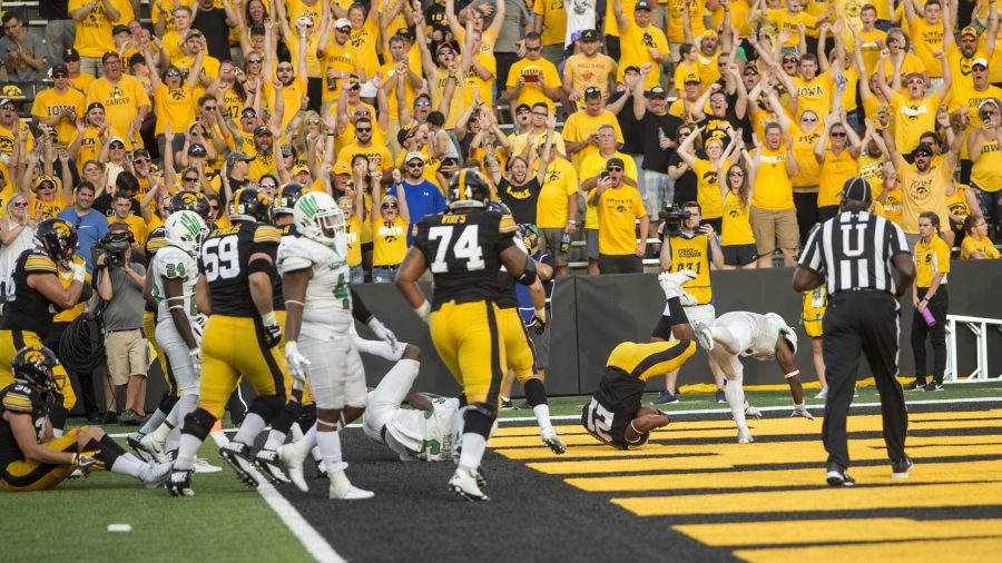 Fans+celebrate+after+Iowa+running+back+Ivory+Kelly-Martin+scores+a+touchdown+during+the+game+between+Iowa+and+North+Texas+at+Kinnick+Stadium+on+Saturday%2C+Sept.+16%2C+2017.+Iowa+defeated+the+Mean+Green+31-14.+%28Nick+Rohlman%2FThe+Daily+Iowan%29