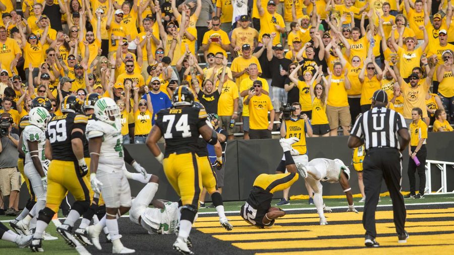 Iowa fans celebrate after Ivory Kelly-Martin scores a touchdown during the game between Iowa and North Texas at Kinnick Stadium on Saturday Sept. 16, 2017. Iowa won 31-14. (Nick Rohlman/The Daily Iowan)