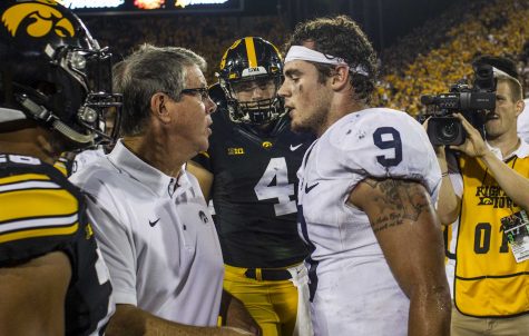 Iowa quarterbacks coach Ken OKeefe exchanges words with Penn State quarterback Trace McSorley after McSorley punted the ball in celebration after Iowas game against Penn State at Kinnick Stadium on Sept. 23, 2017. Penn State defeated Iowa 21-19 on a last second touchdown pass.