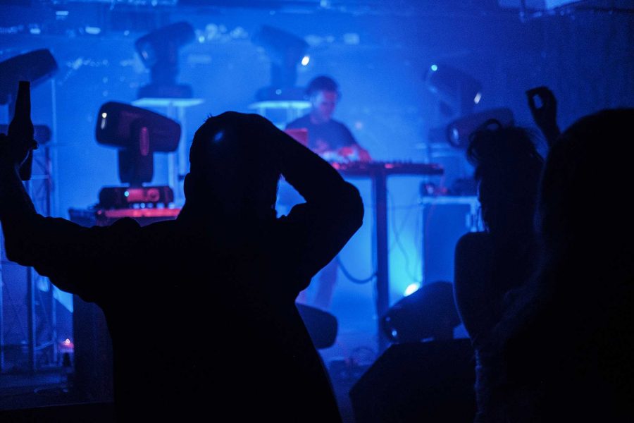 Festival goers dance at Gabe's during the Middle of Nowhere Festival Techno showcase on Friday Sept. 1, 2017. The Middle of Nowhere Festival is a new music festival in Iowa City meant to showcase electronic dance music in Iowa and the Midwest (Nick Rohlman/The Daily Iowan)