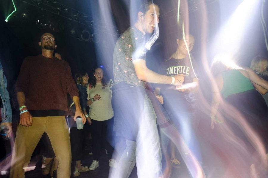 Guests dance while Daedelus performs at Blue Moose during the Middle of Nowhere Festival on Saturday Sept. 2, 2017. The Middle of Nowhere Festival is a new music festival in Iowa City meant to showcase electronic dance music in Iowa and the Midwest (Nick Rohlman/The Daily Iowan)