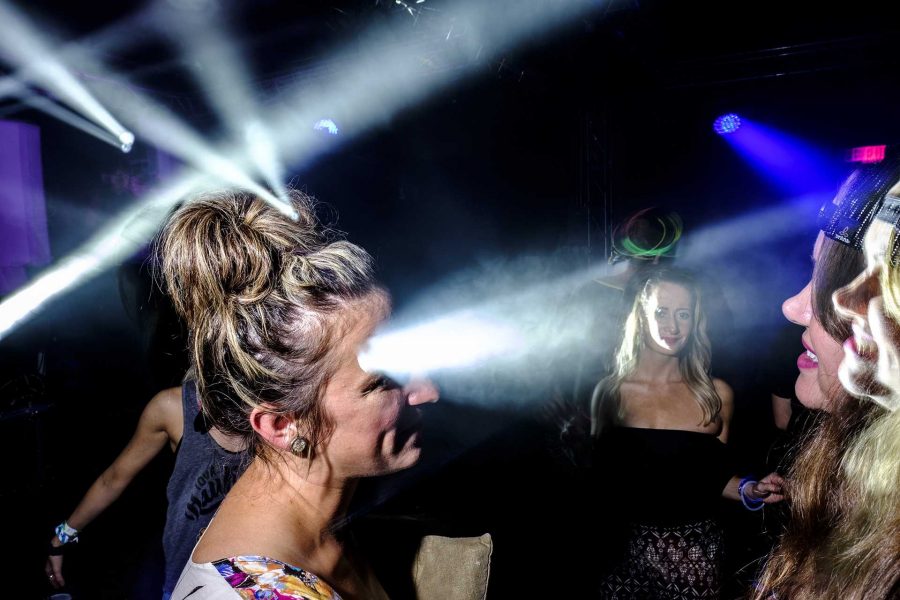 Guests dance while Daedelus performs at Blue Moose during the Middle of Nowhere Festival on Saturday Sept. 2, 2017. The Middle of Nowhere Festival is a new music festival in Iowa City meant to showcase electronic dance music in Iowa and the Midwest (Nick Rohlman/The Daily Iowan)