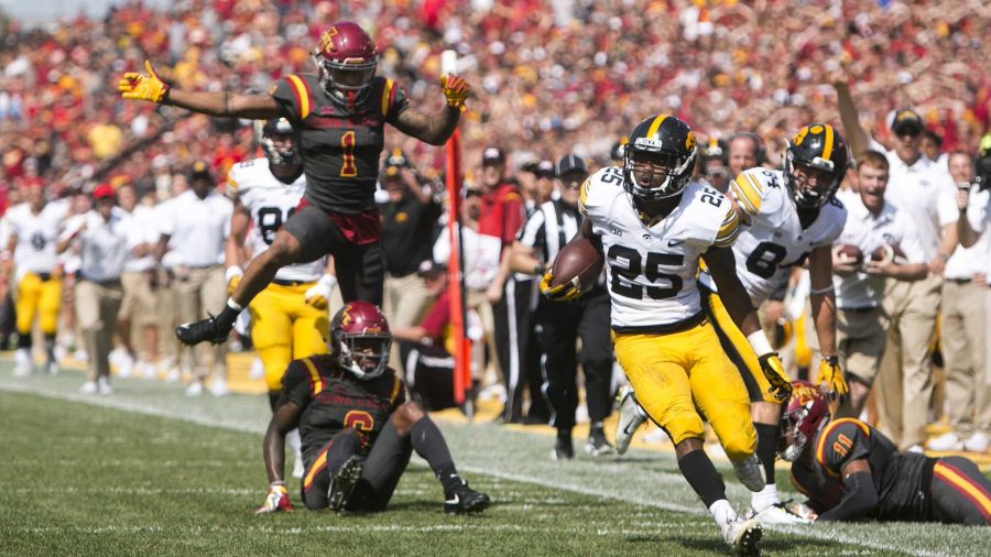 Iowa running back Akrum Wadley runs into the end zone during the Iowa/Iowa State game for the Cy-Hawk trophy in Jack Trice Stadium on Saturday, Sept. 9, 2017. The Hawkeyes defeated the Cyclones, 44-41, in overtime.(Joseph Cress/The Daily Iowan)