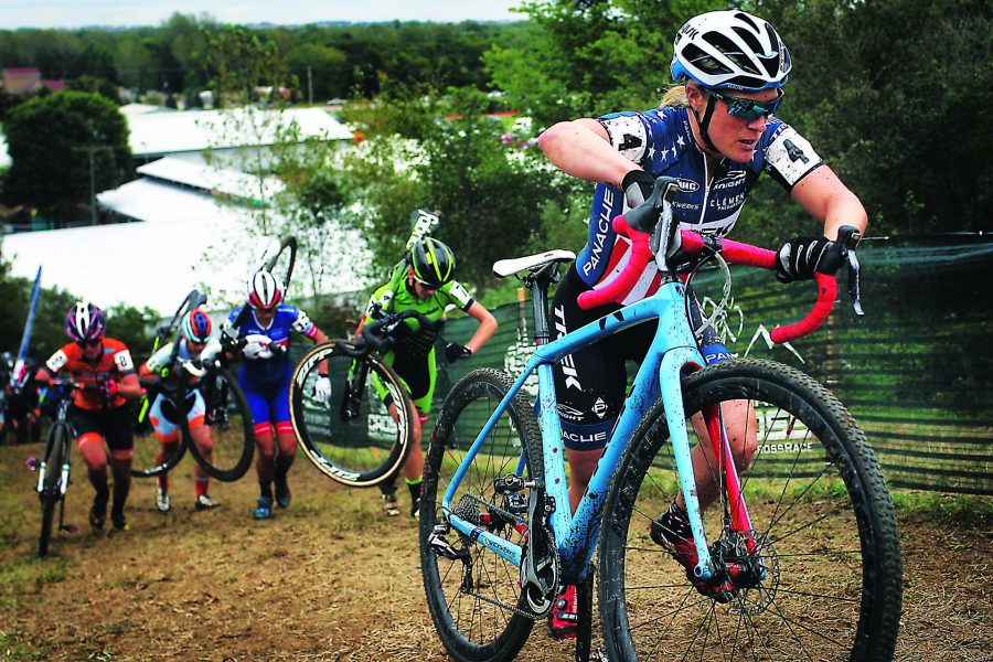 Katie Compton of Wilmington, Delaware climbs Mount Crumpit during the Volkswagen UCI (Union Cycliste Internationale) Elite Women race at Jingle Cross in the Johnson County Fairgrounds on Sunday, September 25, 2016. Iowa City was the second city in the United States to host a cyclocross World Cup event after Las Vegas. (The Daily Iowan/Joseph Cress)