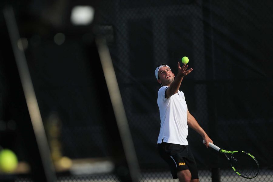 Iowas Josh Silverstein attempts to serve the ball during the Iowa-University of North Dakota game at the Hawkeye Tennis and Recreation Complex on Sunday, April 23, 2017. The Hawkeyes defeated the Fighting Hawks, 7-0. (The Daily Iowan/Margaret Kispert)