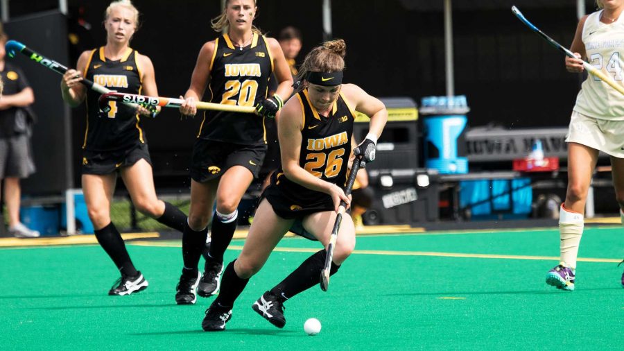 Iowas Madeleine Murphy plays the ball during the Iowa vs. Wake Forest field hockey match on Saturday, August 26, 2017. Wake Forest defeated Iowa by a final score of 3-2. (David Harmantas/The Daily Iowan)