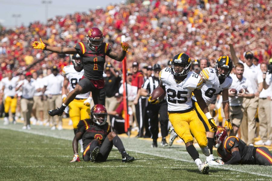 Iowa running back Akrum Wadley runs into the end zone during the Iowa/Iowa State game for the Cy-Hawk trophy in Jack Trice Stadium on Saturday, Sept. 9, 2017. The Hawkeyes defeated the Cyclones, 44-41, in overtime.(Joseph Cress/The Daily Iowan)