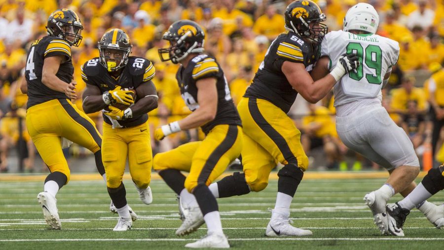 Iowas+James+Butler+carries+the+ball+during+the+game+between+Iowa+and+North+Texas+at+Kinnick+Stadium+on+Saturday+Sept.+16%2C+2017.+Iowa+won+31-14.+%28Nick+Rohlman%2FThe+Daily+Iowan%29