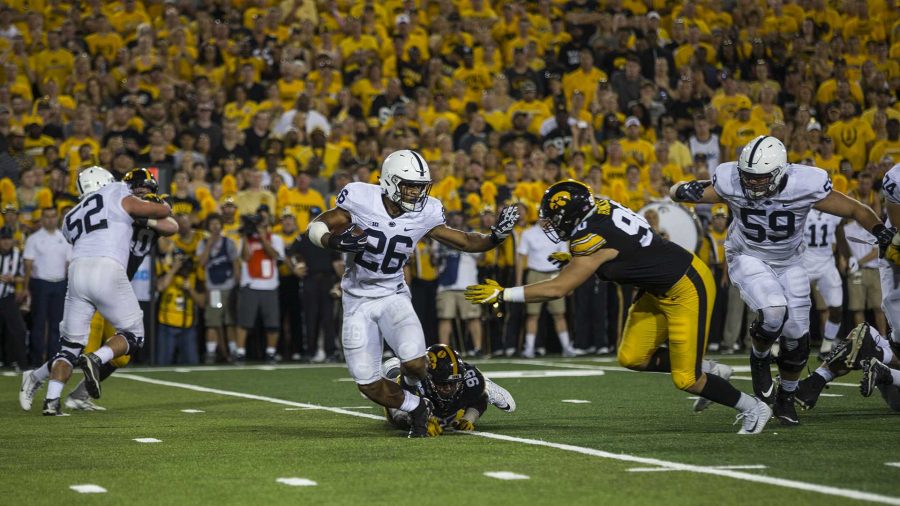 Penn State’s Saquon Barkley carries the ball during Iowa’s game against Penn State in Kinnick Stadium on Sept. 23. Barkley set a Penn State school record with 358 all-purpose yards. Penn State defeated Iowa, 21-19, on a last-second touchdown pass. (Nick Rohlman/The Daily Iowan)