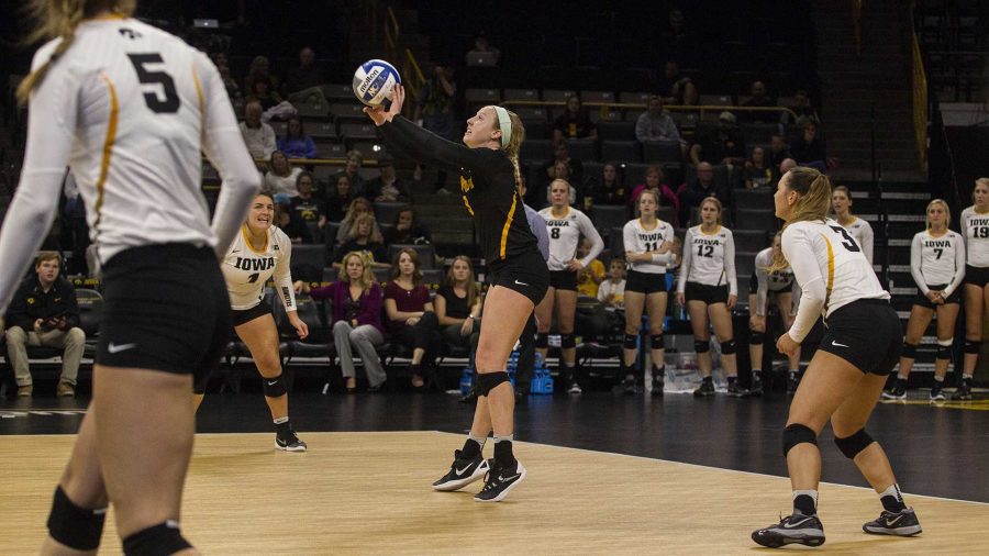 Iowas Annika Olsen receives the ball during a volleyball match at the Carver Hawkeye Arena in Iowa City on Friday, Oct 7, 2016. Iowa defeated Purdue 3-2. (The Daily Iowan/Ting Xuan Tan)