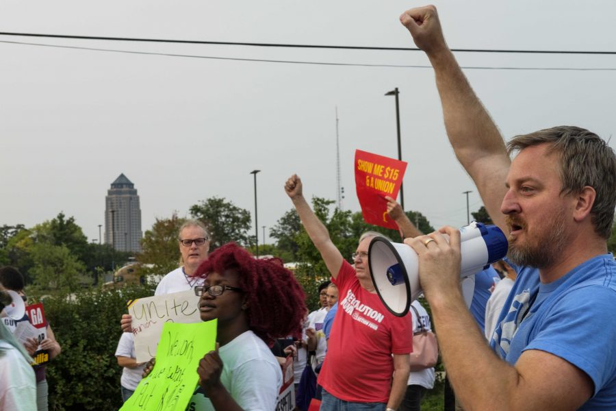 Protestors shout on Monday September, 4 2017. Protestors attended multiple events in Des Moines on Labor Day in order to demonstrate in support of a fifteen dollar per hour minimum wage and private sector unions. (Nick Rohlman/The Daily Iowan)