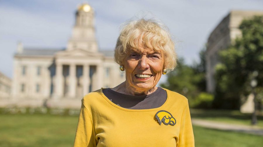Iowa+super+fan+Marilyn+Neely+stands+in+front+of+the+Old+Capitol+on+Sunday.+Neely+has+attended+every+Hawkeye+Big+Ten+opener+for+70+years.+%28Nick+Rohlman%2FThe+Daily+Iowan%29