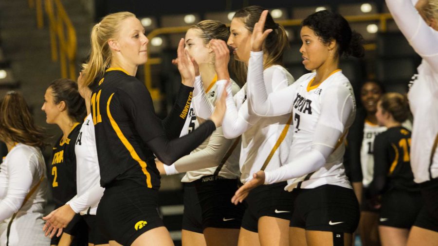 Iowas+Kelsey+ONeill+high-fives+teammates+while+going+through+introductions+during+the+volleyball+Black+%26amp%3B+Gold+scrimmage+in+Carver-Hawkeye+Arena+on+Saturday%2C+Aug.+19%2C+2017.+%28Joseph+Cress%2FThe+Daily+Iowan%29