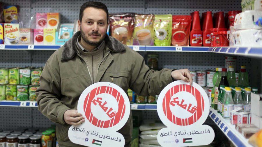 In the southern West Bank city of Dura, shopkeeper Murad Amro says he is trying to comply with the Palestinian Authority's call for a boycott, but his customers love Israeli coffee and milk. The Palestinian Authority declared a boycott of six major Israeli food companies in February to protest Israel's freezing of $125 million in tax tranfers. (Daniella Cheslow/McClatchy DC/TNS)