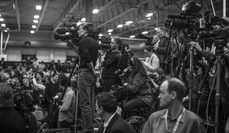 Media outlets cover Donald Trumps speech from the press booth at the University Field House on Tuesday, Jan 26, 2016.  Donald Trump and Ted Cruz are currently tied in Iowa. (The Daily Iowan/Jordan Gale)