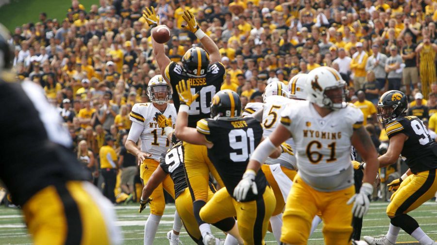 Iowa+defensive+end+Parker+Hesse+attempts+to+block+Wyoming+quarterback+Josh+Allens+pass+during+an+NCAA+football+game+between+Iowa+and+Wyoming+in+Kinnick+Stadium+on+Saturday%2C+Sept.+2%2C+2017.+The+Hawkeyes+defeated+Wyoming%2C+24-3.+%28Joseph+Cress%2FThe+Daily+Iowan%29