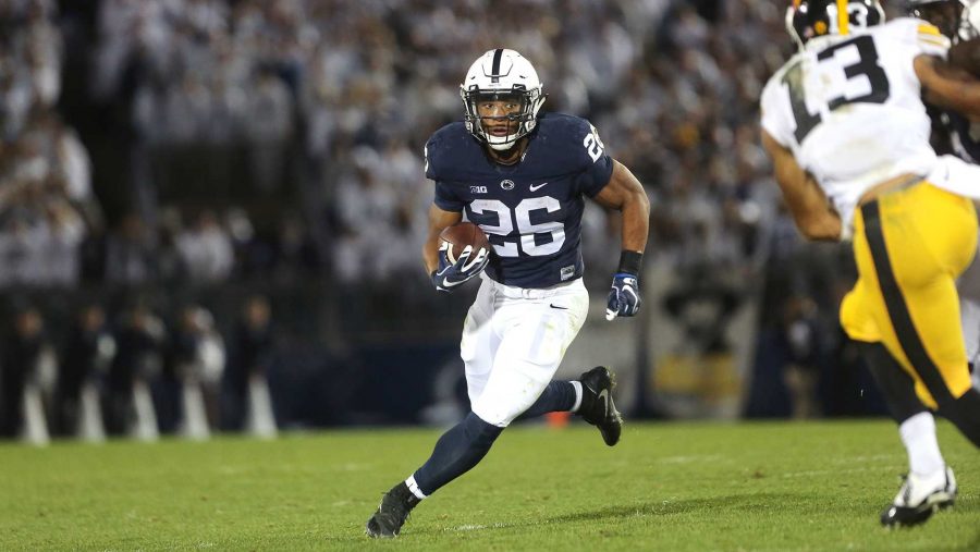Penn+State+running+back+Saquon+Barkley+runs+with+the+ball+during+the+Iowa-Penn+State+game+in+Beaver+Stadium+in+College+State+on+Saturday%2C+Nov.+5%2C+2016.+The+Nittany+Lions+defeated+the+Hawkeyes%2C+41-14.+%28The+Daily+Iowan%2FMargaret+Kispert%29