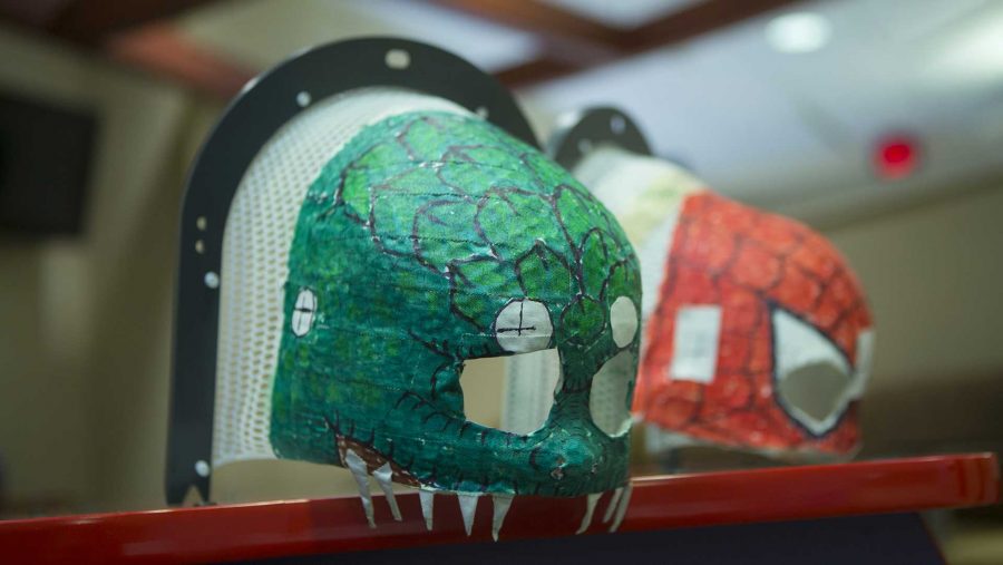 Painted radiation masks are shown in the Pomerantz Pavilian Radiation Oncology Center on Wednesday, Sep. 6, 2017. (Lily Smith/The Daily Iowan)