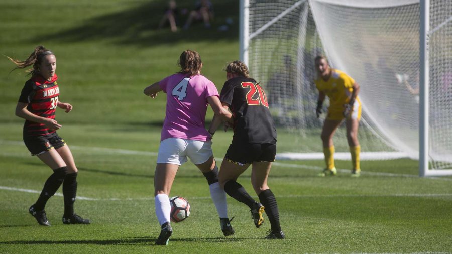 Iowa forward Kaleigh Haus battles Maryland defender Niven Hegeman for the ball at the Iowa Soccer Complex on Sunday, Oct. 8, 2017. The Hawkeyes defeated the Terrapins 4-0. (Ashley Morris/The Daily Iowan)